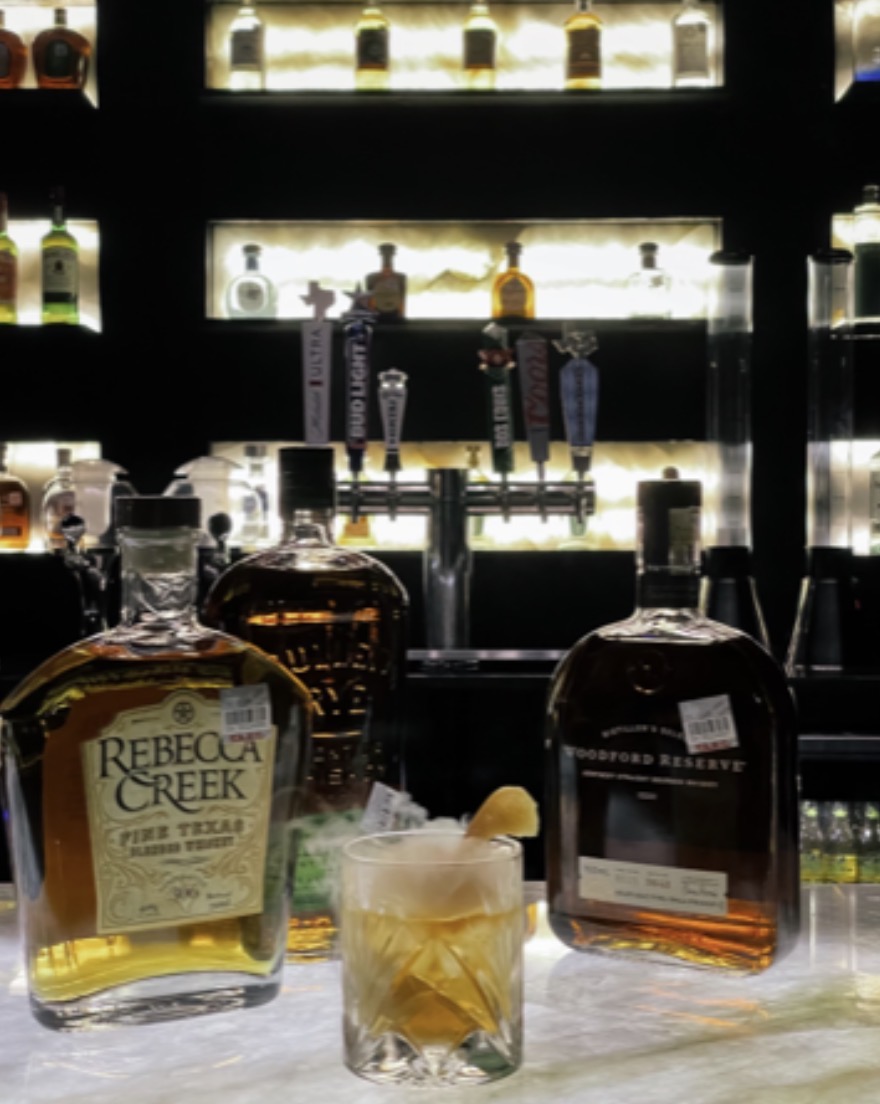 Rebecca Creek and Woodford Reserve whiskey at Lux Lounge